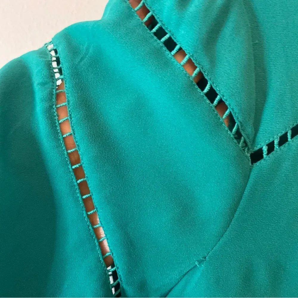 Ann Taylor Loft green jewel toned blouse with cut out detail size S.